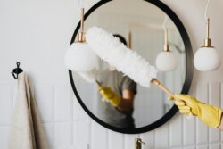 dusting a mirror